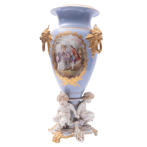 229 - A large Limoges [Henri Ardant & Co.] porcelain vase of amphora form with lion mask ring handles and ... 