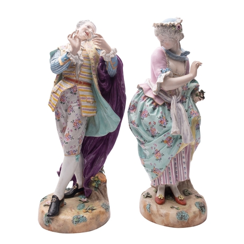 230 - A pair of large late 19th century Continental porcelain figures of a gallant and companion wearing c... 