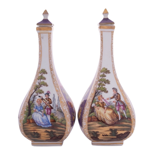 244 - A pair of Dresden [Potschappel] square-section bottle vases and covers painted in the Augustus Rex m... 