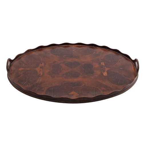 255 - A George III oval oyster laburnum tray, late 18th century; formed of radiating veneers, the wavy edg... 