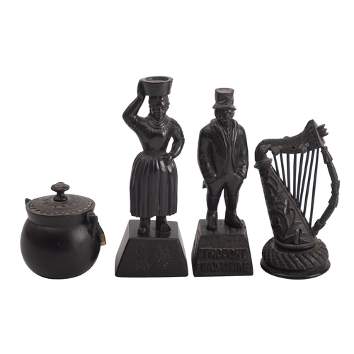 256 - Four items of Victorian Irish carved bog oak souvenirware, 19th century; comprising a model of a har... 