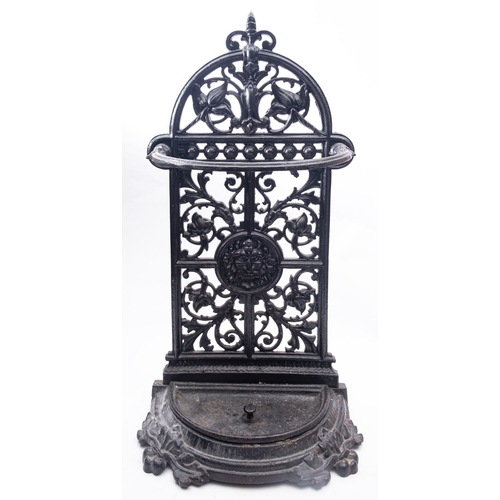 260 - A Victorian painted cast iron stick stand, late 19th century; with openwork scrolling foliate cast a... 