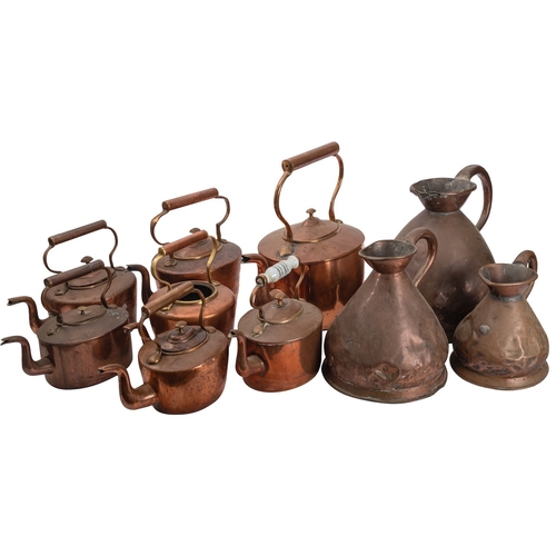 263 - Seven various Victorian copper kettles, second half 19th century; of typical form, the largest 38cm ... 