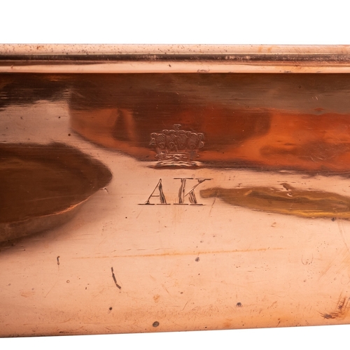 275 - A rectangular copper twin handled pan, early 19th century; engraved with AK beneath a coronet, 10cm ... 