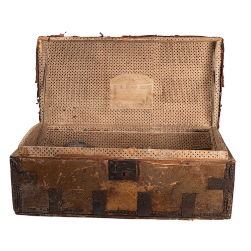 296 - A George III horse hide covered domed top coaching trunk, late 18th century; with riveting and metal... 