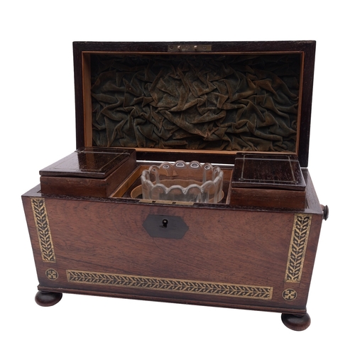 300 - A Regency rosewood and brass inlaid tea caddy, circa 1815; of sarcophagus form, the top with beaded ... 