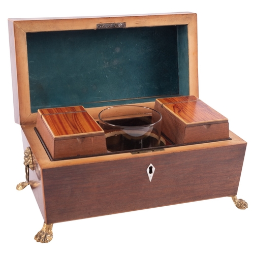 307 - A Regency mahogany and sycamore strung tea caddy, early 19th century; of sarcophagus form; the hinge... 