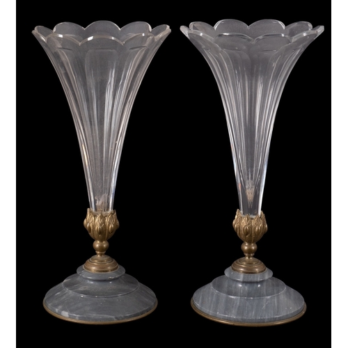 320 - A pair of gilt-metal and marble mounted glass trumpet vases of slice-cut petal form, on striated gre... 