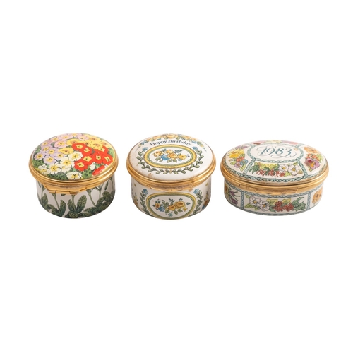 333 - A group of three Halcyon Days enamel boxes including 'Happy Birthday' and '1983', the latter 5cm wid... 