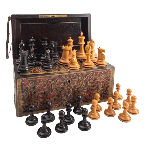 337 - A Staunton pattern ebony and boxwood weighted chess set, probably by F.H.Ayers, circa 1900; one rook... 