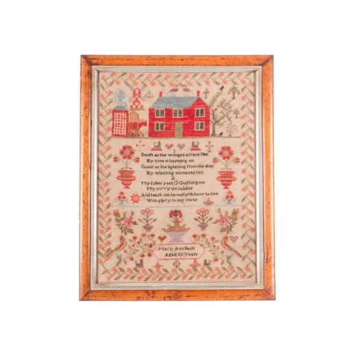 344 - A mid 19th century needlework sampler by Mary Ann Buck aged 10 years, worked with a design including... 