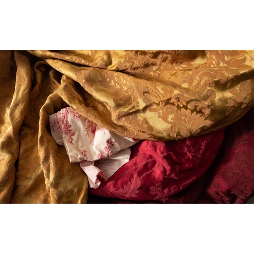 354 - A large quantity of Damask and other fabrics, 20th century; including two pairs of crimson damask cu... 