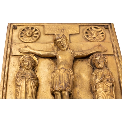 355 - A gilt bronze Missal cover in French Mediaeval style; with the Crucifiction portrayed in high relief... 