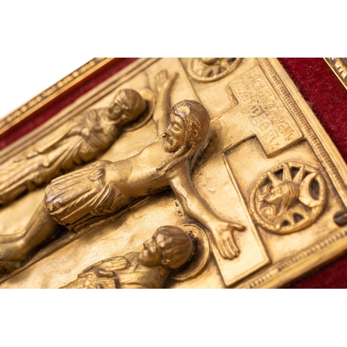 355 - A gilt bronze Missal cover in French Mediaeval style; with the Crucifiction portrayed in high relief... 