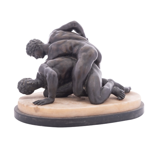 377 - A Continental patinated bronze group of the Uffizi Wrestlers, cast after the Antique, late 19th cent... 