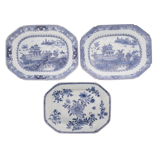 38 - A pair of Chinese blue and white octagonal dishes and one similar the pair painted with pagodas and ... 