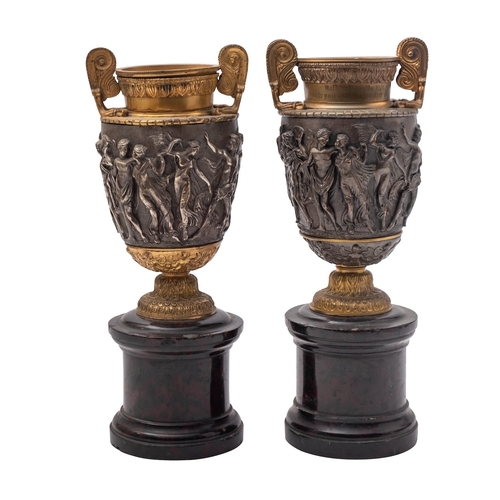 384 - A matched pair of patinated and gilt metal models of the Townley Vase, late 19th century; modelled a... 