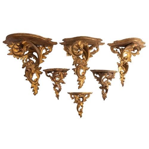 403 - Six Italian carved and giltwood wall brackets, 20th century; of varying size; all with shaped platfo... 