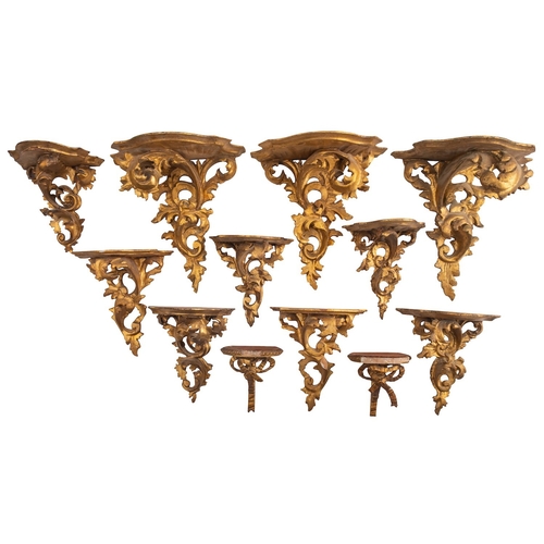 404 - A group of twelve Italian carved and giltwood wall brackets, 20th century; comprising five pairs and... 