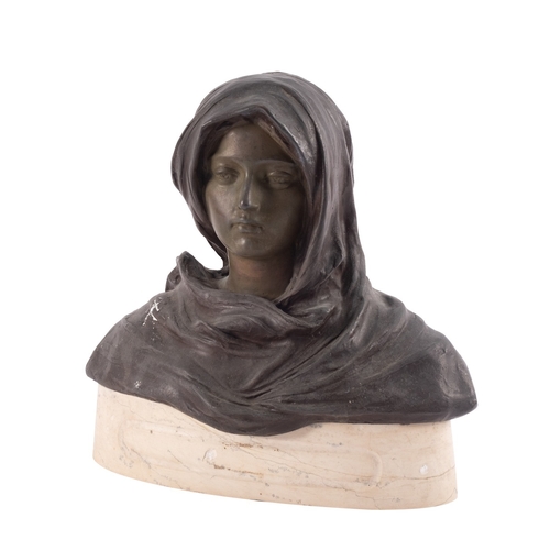 406 - A patinated metal bust of a maiden, early 20th century; portrayed with serene visage looking straigh... 