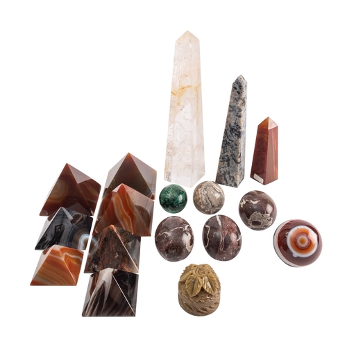 411 - A group of semi-precious hardstone ornaments; including a rock crystal obelisk, 24cm high, (damaged)... 