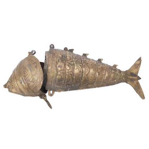 417 - A West African, possibly Fon/Benin, cast brass box in the form of a fish, 38cm long.