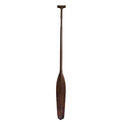 423 - A South Pacific hardwood paddle, 167cm long.