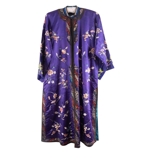 427 - A Chinese hand-embroidered floral blue and purple silk robe, circa 1920s