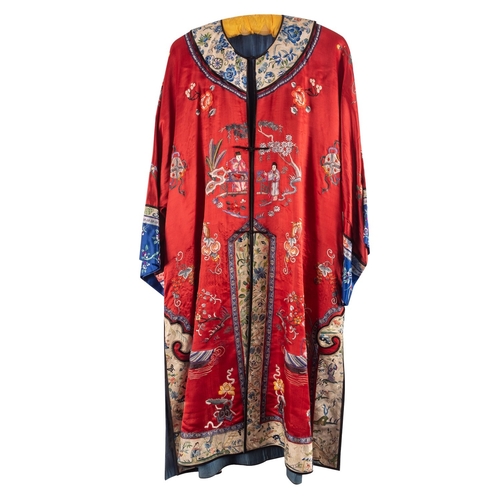 428 - A Chinese hand-embroidered red silk robe, with floral and figural decoration, circa 1920s