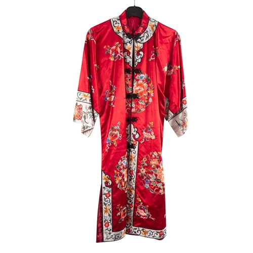 430 - A Chinese hand-embroidered red silk robe, with floral decoration, circa 1950s