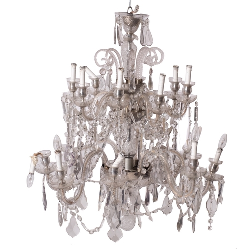 446 - A cut glass sixteen light chandelier in Louis XV taste, 20th century; the two tiers each of eight sc... 