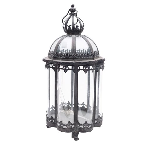 449 - A metal and glazed ceiling lantern, of recent manufacture; with onion form open vent above the domed... 