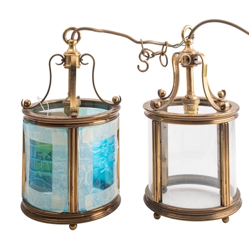 462 - A pair of brass and glazed ceiling lanterns, in Regency taste, 20th century; each with scrolling sup... 