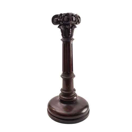 464 - A carved and stained hardwood columnar table lamp, late 19th /early 20th century; with Composite cap... 