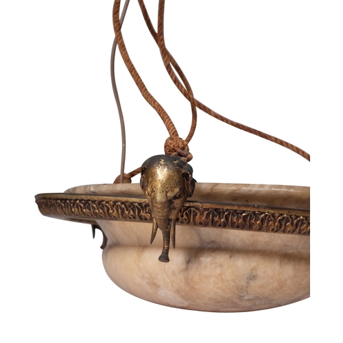 467 - An Italian gilt metal mounted alabaster dish light, early 20th century; the waisted stone shade with... 