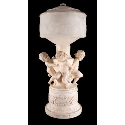 469 - An imposing Italian sculpted alabaster table or pier lamp, circa 1900; with domed cover to a cylindr... 