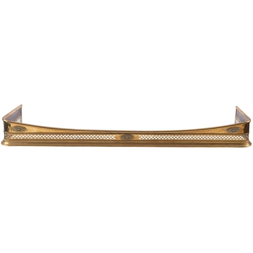 479 - A Regency brass fender, circa 1815; of rectangular section; the toprail dipping at front centre, abo... 