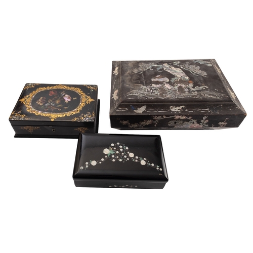 481 - A Victorian painted, shell inset and parcel gilt black papier mache box, circa 1870; the cover with ... 