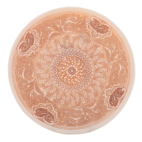 A Thomas Webb 'ivory' cameo glass plate: carved and brown patinated ...