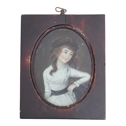 506 - A Chinese reverse painted miniature half portrait on glass, depicting a young girl in white dress wi... 