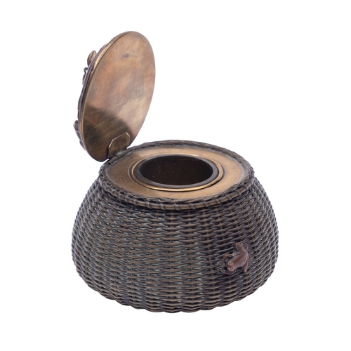 537 - A Japanese patinated mixed metal inkwell in the form of a wicker lobster pot, the cover relief decor... 