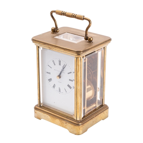 555 - Matthew Norman a modern Swiss brass carriage clock the eight-day duration movement having a platform... 