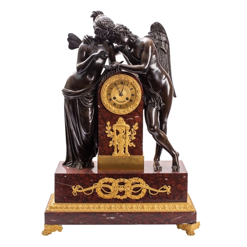 566 - P. Colmar, Paris, a rouge griotte marble and bronze mantel clock, the eight-day duration movement st... 