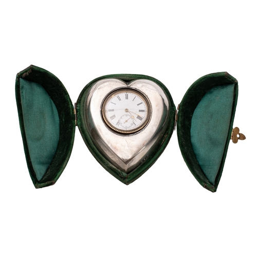 569 - A heart-shaped silver mounted easel clock having an eight-day duration timepiece movement, the white... 