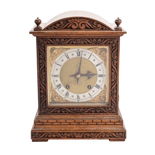 573 - Winterhalder & Hofmeier, Schwaerzenbach, an oak mantel clock the eight-day duration movement strikin... 