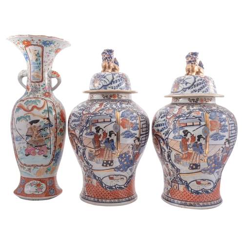 61 - A large pair of reproduction Chinese Imari jars and covers together with a large Japanese Arita vase... 