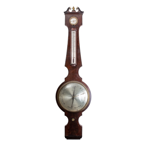 615 - Malaerida, London a Georgian mahogany wheel barometer with the ten-inch engraved with usual baromete... 