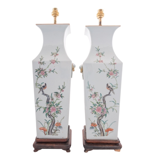 62 - A pair of large Chinese porcelain vases, converted as lamps, of shouldered square profile, with lion... 