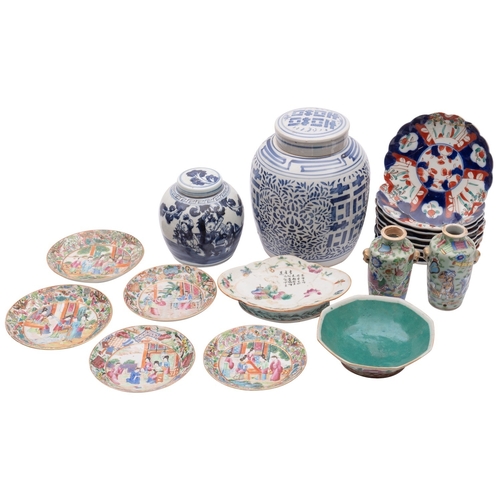 65 - A mixed lot of Chinese and Japanese porcelain including a group of five Canton famille rose saucer d... 