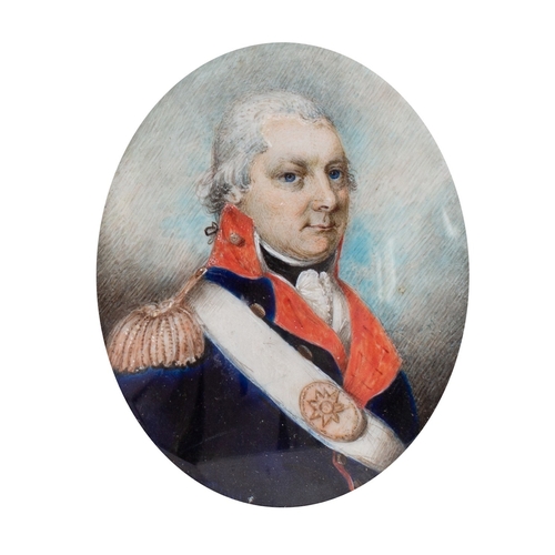 666 - British School, 19th Century A portrait miniature of an Officer in a Blue coat with red collar and l... 